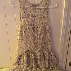 Fun & Flirt Floral Sleeveless Blouse with ruffle down front